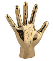 open hand sculpture in brass design by noir 1