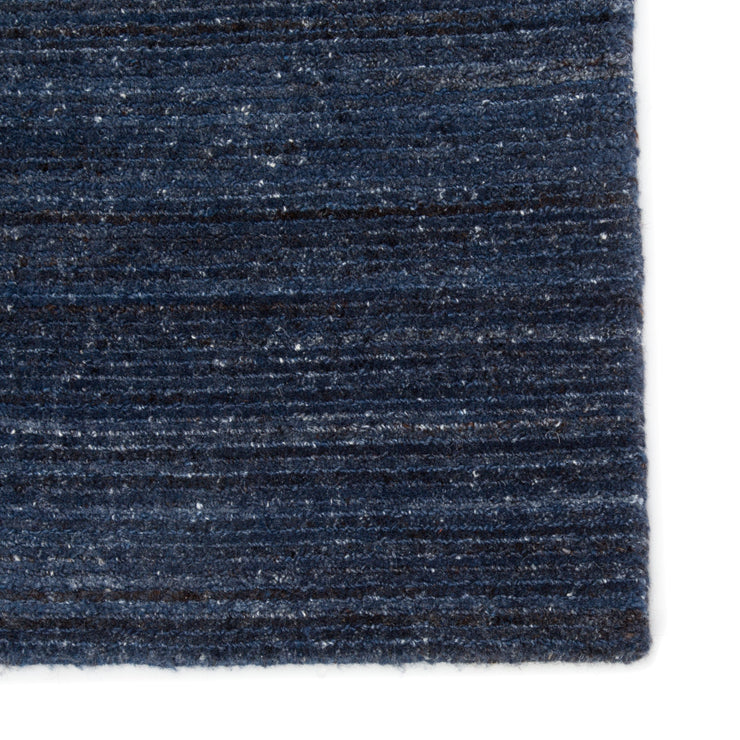 vassa solid rug in blue wing teal sky captain design by jaipur 4