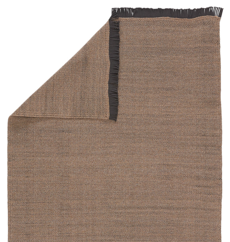 savvy handmade indoor outdoor solid tan black area rug by jaipur living 3