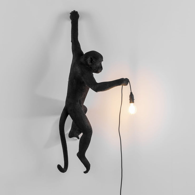 the monkey lamp in black hanging version design by seletti 3