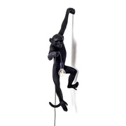 the monkey lamp in black hanging version design by seletti 1