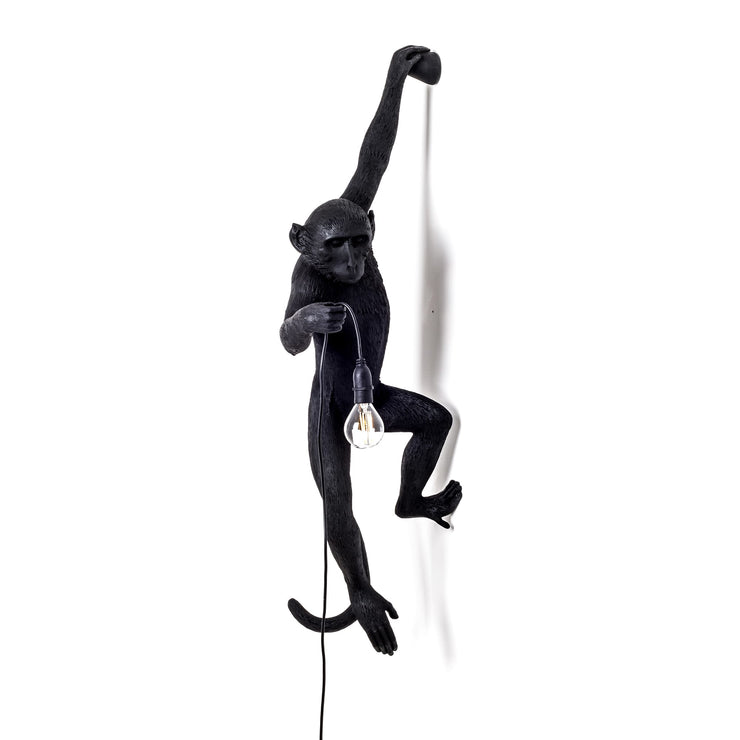 the monkey lamp in black hanging version design by seletti 1