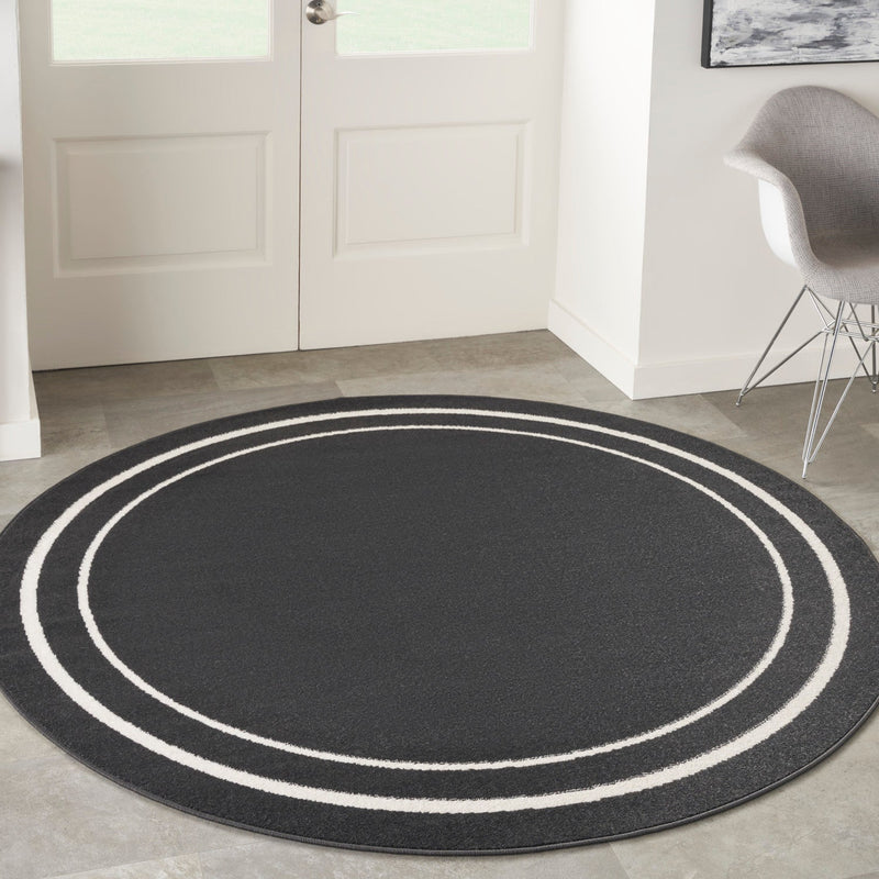 media image for Nourison Home Nourison Essentials Black Ivory Contemporary Rug By Nourison Nsn 099446136633 17 220