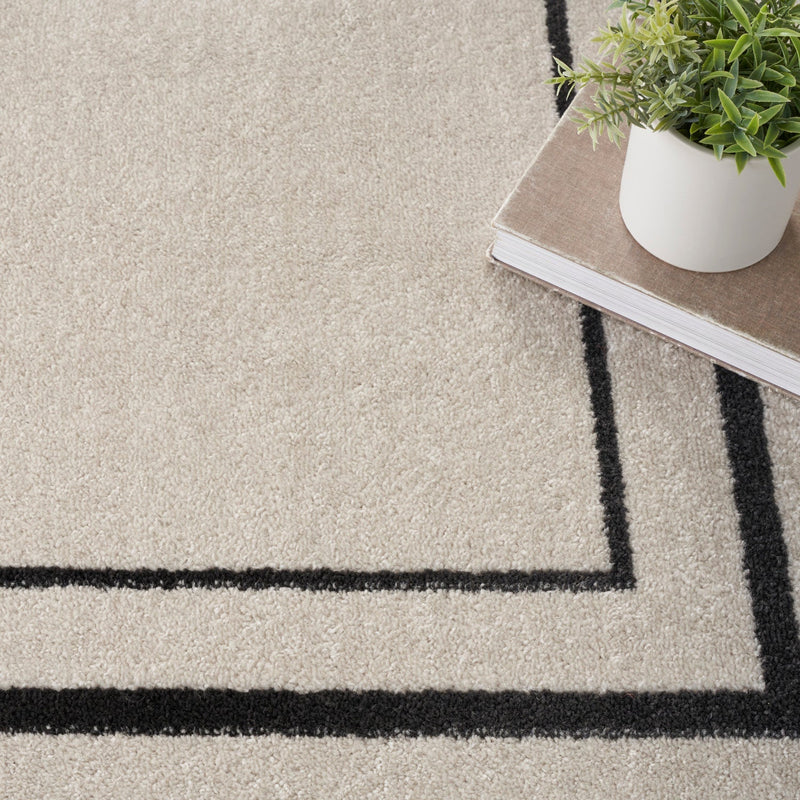 media image for Nourison Home Nourison Essentials Ivory Black Contemporary Rug By Nourison Nsn 099446148162 21 269