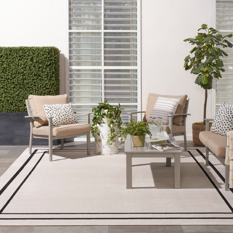 media image for Nourison Home Nourison Essentials Ivory Black Contemporary Rug By Nourison Nsn 099446148162 25 214