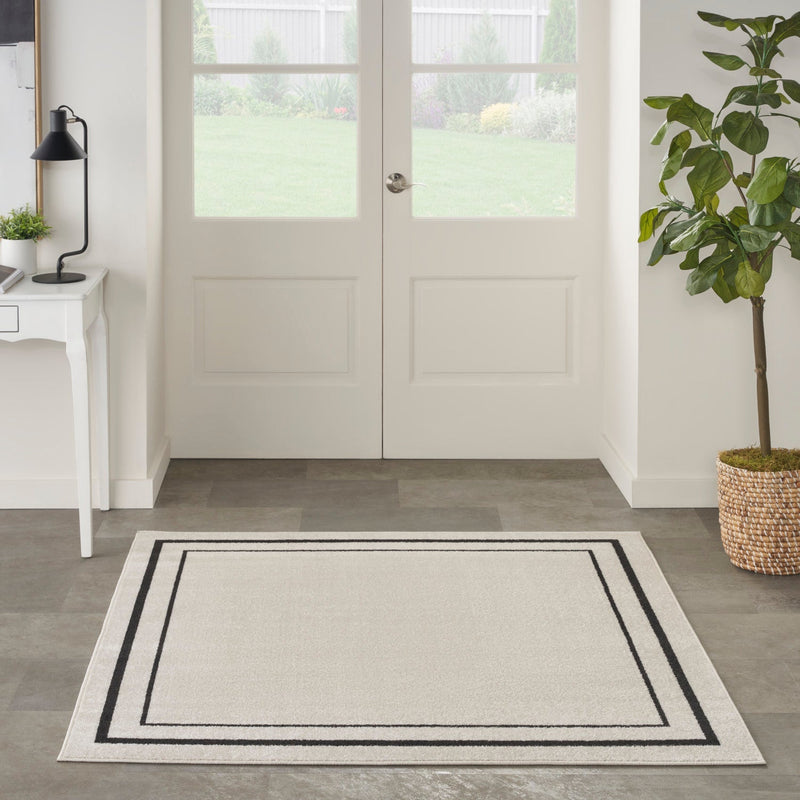 media image for Nourison Home Nourison Essentials Ivory Black Contemporary Rug By Nourison Nsn 099446148162 24 267