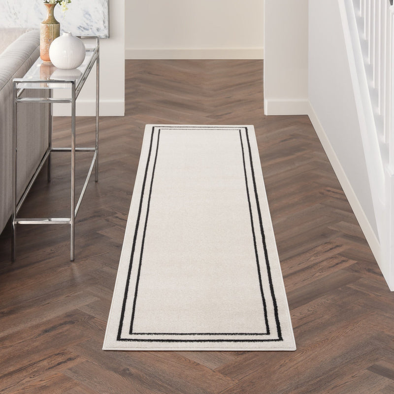 media image for Nourison Home Nourison Essentials Ivory Black Contemporary Rug By Nourison Nsn 099446148162 16 289