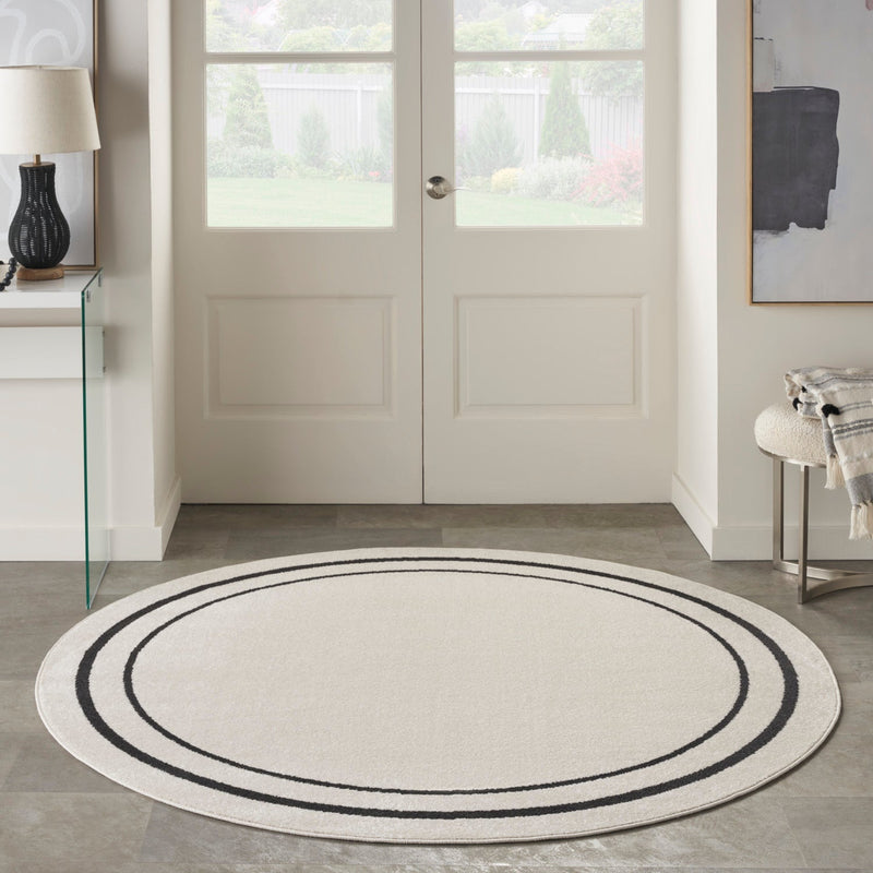 media image for Nourison Home Nourison Essentials Ivory Black Contemporary Rug By Nourison Nsn 099446148162 23 297