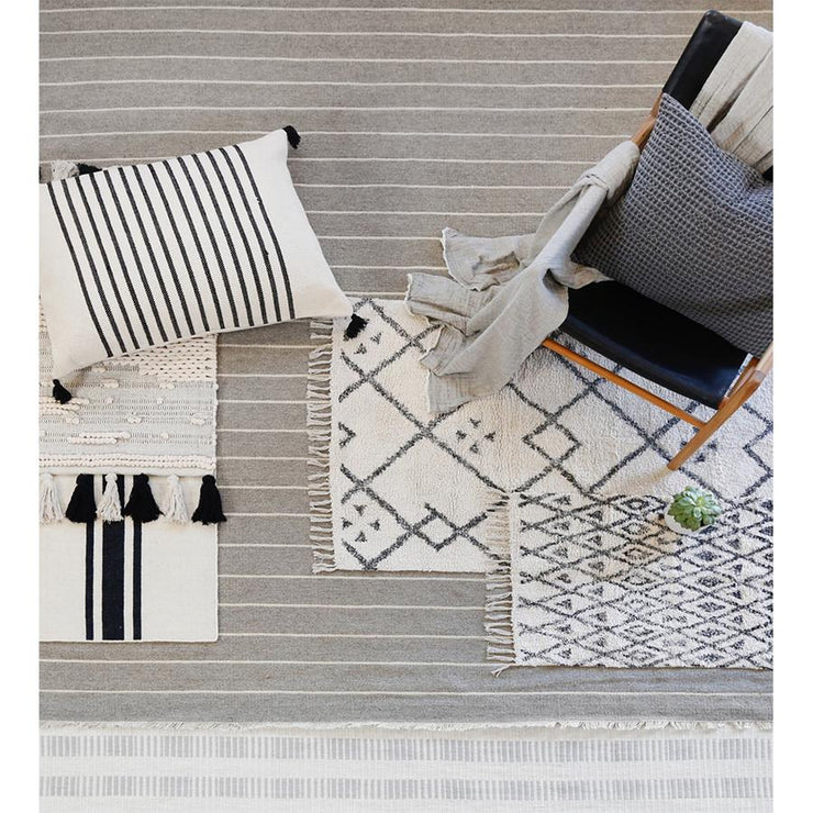 warby handwoven rug in light grey in multiple sizes design by pom pom at home 7