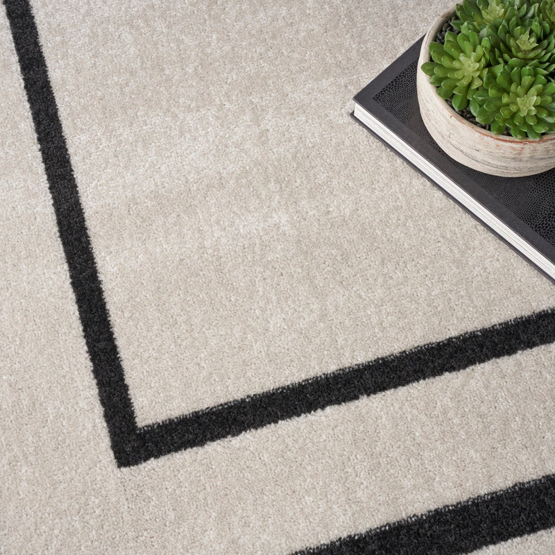 media image for Nourison Home Nourison Essentials Ivory Black Contemporary Rug By Nourison Nsn 099446148162 19 227