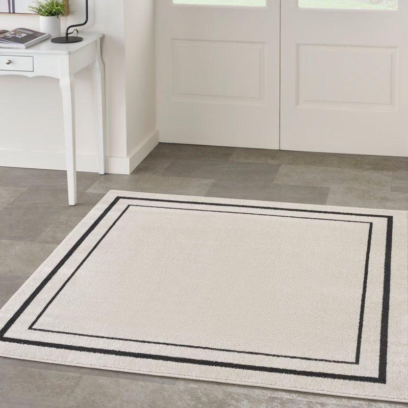 media image for Nourison Home Nourison Essentials Ivory Black Contemporary Rug By Nourison Nsn 099446148162 18 297