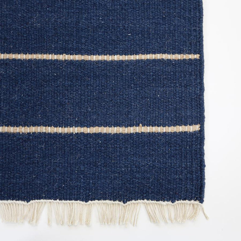 media image for warby handwoven rug in navy in multiple sizes design by pom pom at home 7 265