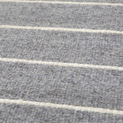 warby handwoven rug in light grey in multiple sizes design by pom pom at home 9
