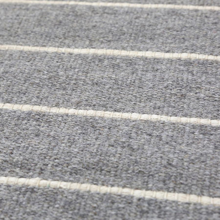 warby handwoven rug in light grey in multiple sizes design by pom pom at home 9