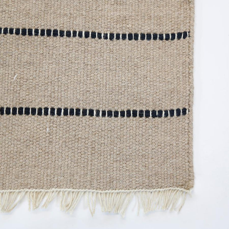 warby handwoven rug in natural in multiple sizes design by pom pom at home 7