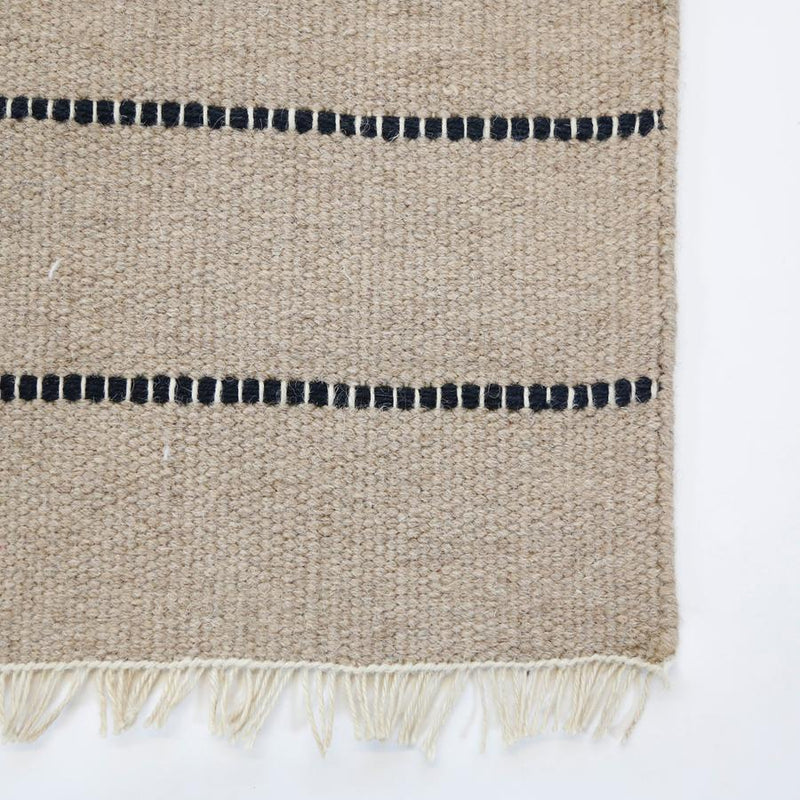 media image for warby handwoven rug in natural in multiple sizes design by pom pom at home 7 233