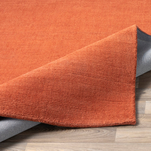 Mystique Wool Burnt Orange Rug Fold Image