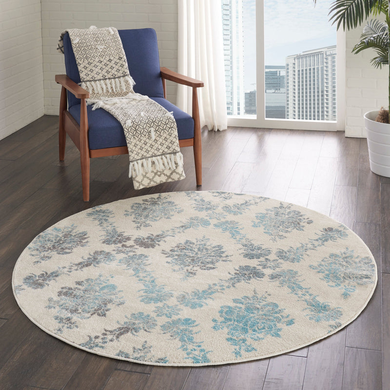 media image for tranquil ivory turquoise rug by nourison nsn 099446399335 10 251